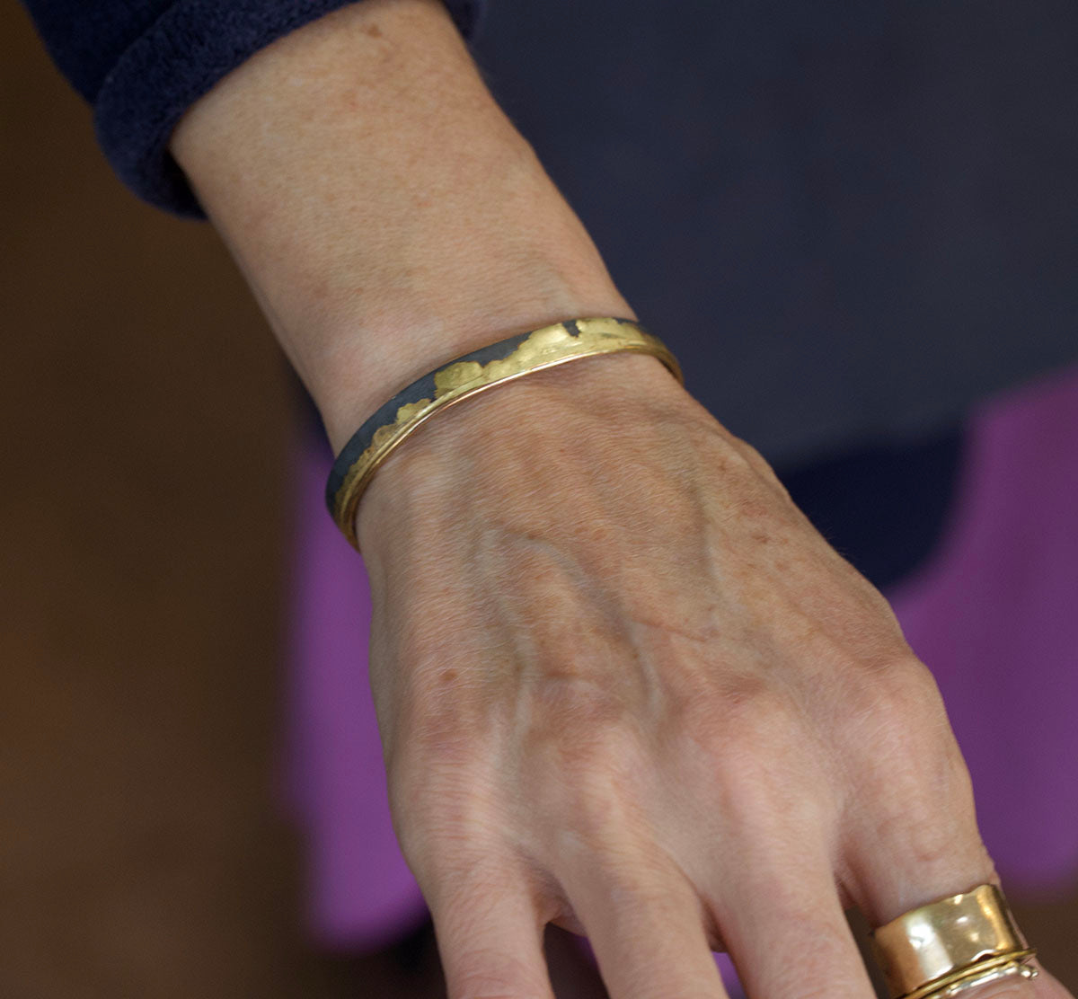 handmade gold edge cuff bracelet with oxidized silver
