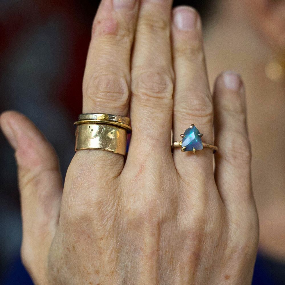 Australian Opal Medium Stone Ring on a Yellow Gold Band