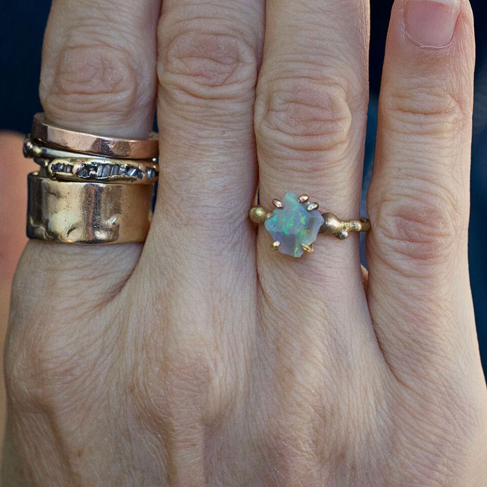 Australian Opal Small Stone Ring on a Yellow Gold Band