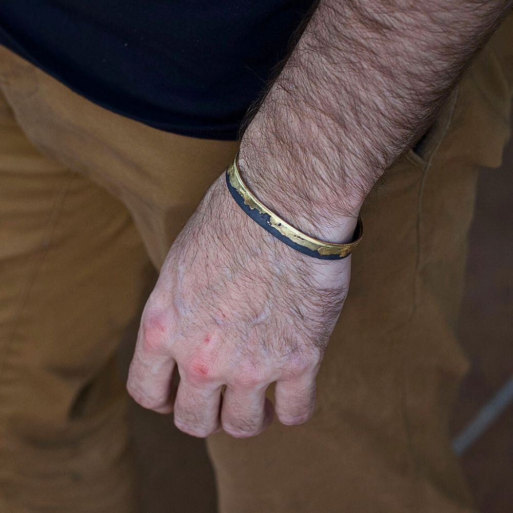 handmade gold edge cuff bracelet with oxidized silver
