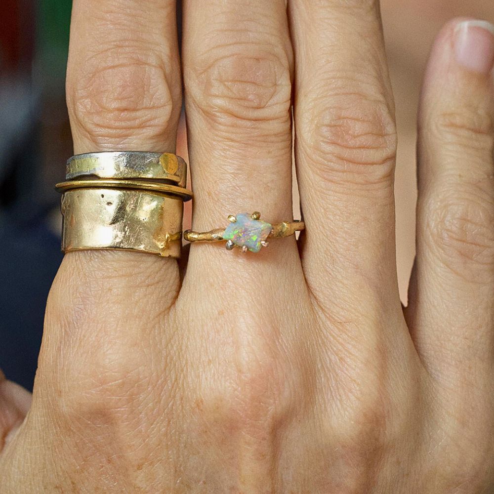 Australian Opal Small Stone Ring on a Yellow Gold Band