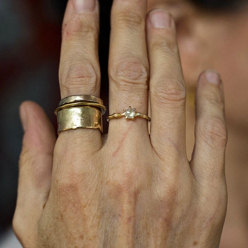 White .4ct Rose Cut Diamond Ring on a Yellow Gold Band