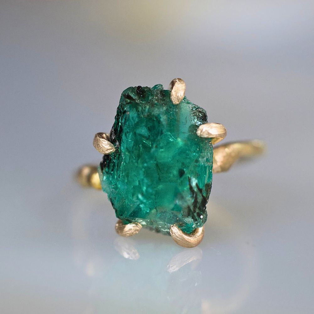 Zambian Emerald Medium Stone Ring on a Yellow Gold Embedded Band