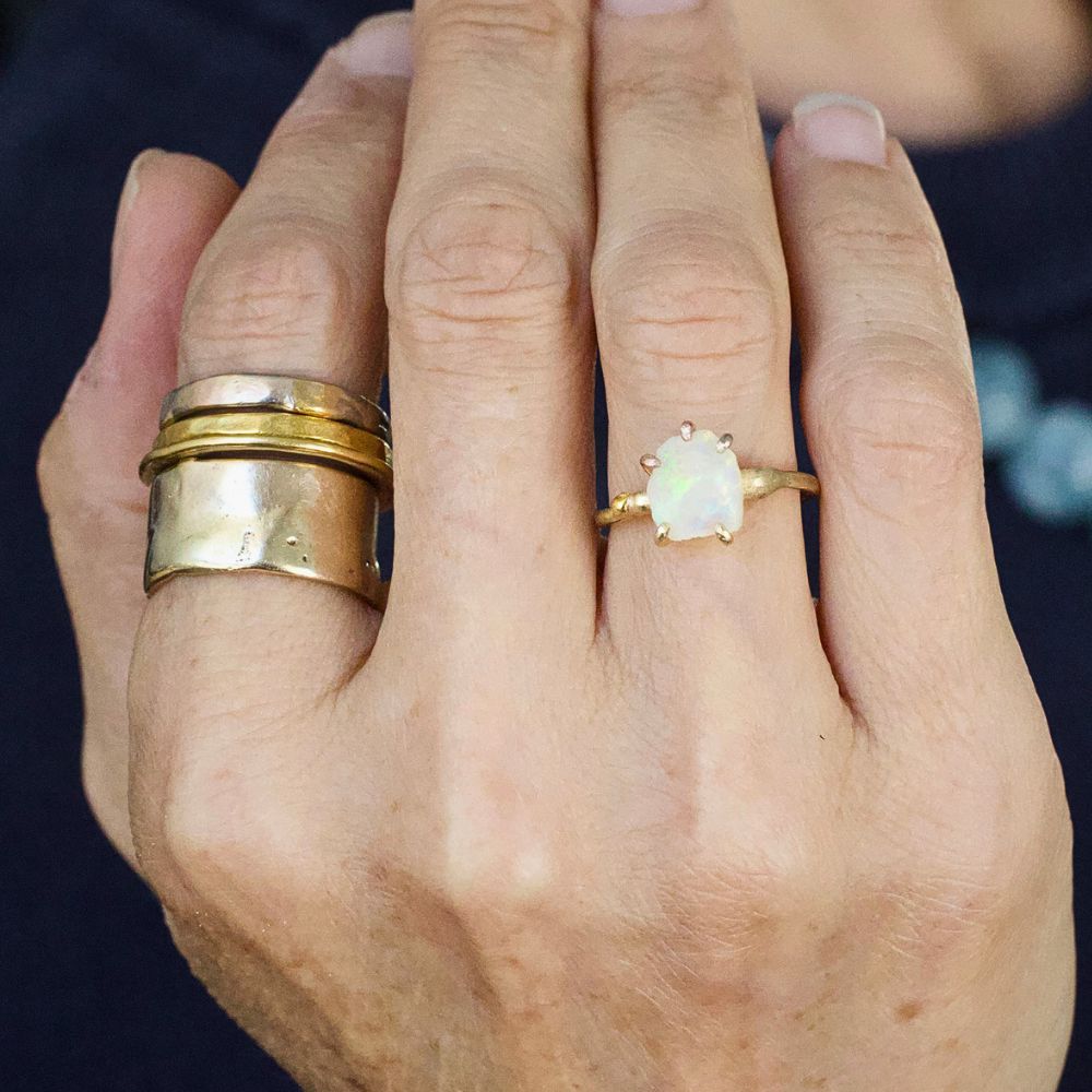 Australian Opal Small Stone Ring on a Yellow Gold Embedded Band