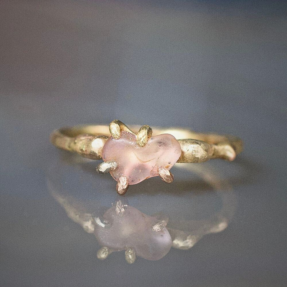 rough pink Montana sapphire ring on gold band