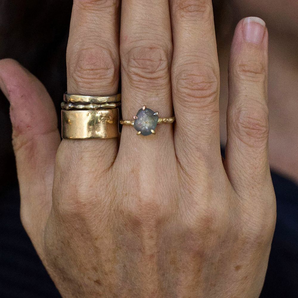 Rough Montana Sapphire Small Stone Ring on a Yellow Gold Embedded Band