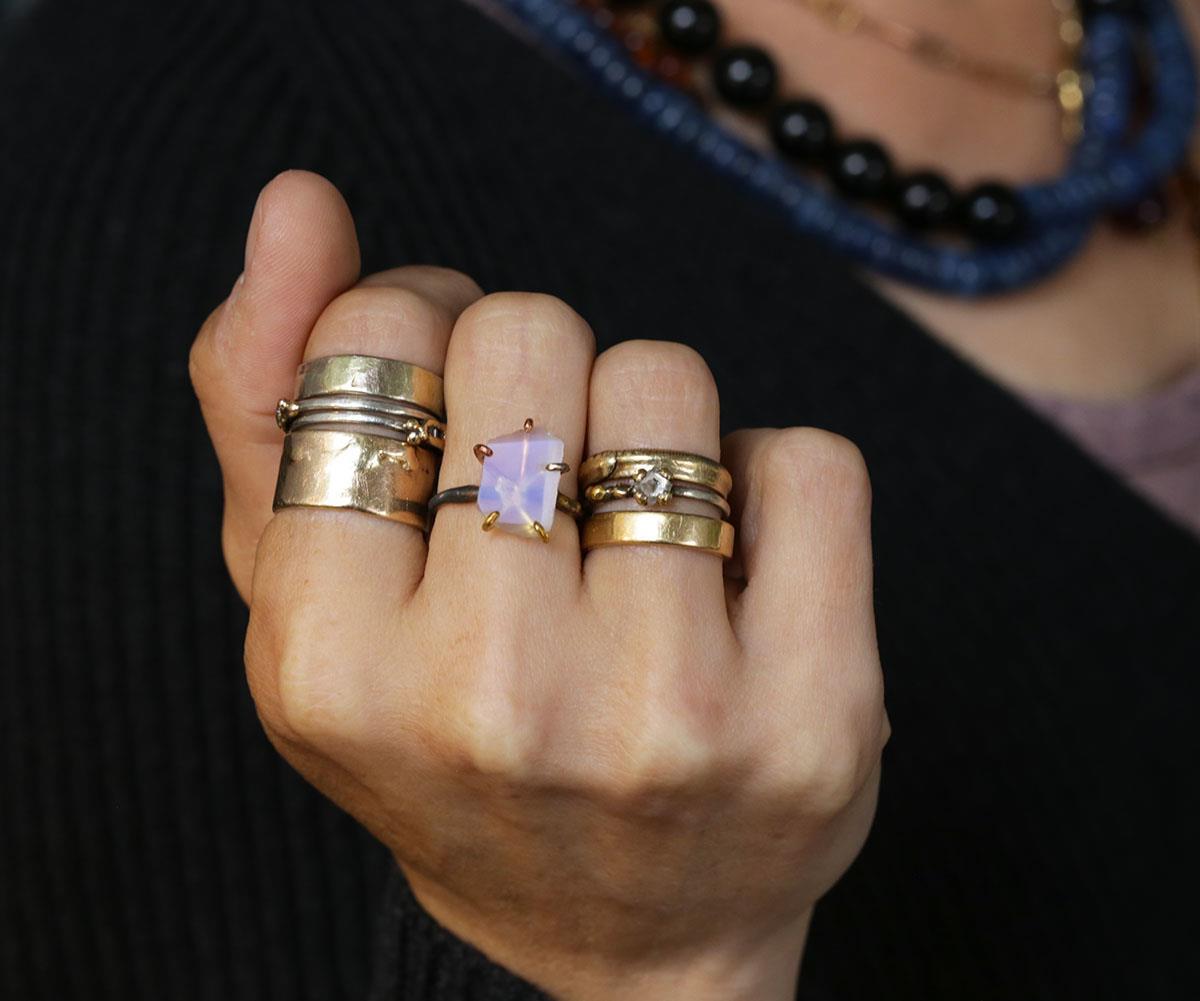 Rainbow Moonstone ring on hand