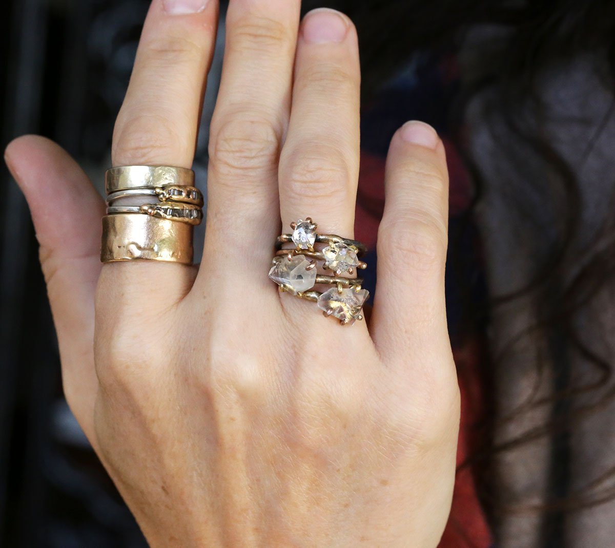 Herkimer Quartz and goshenite rings on hand