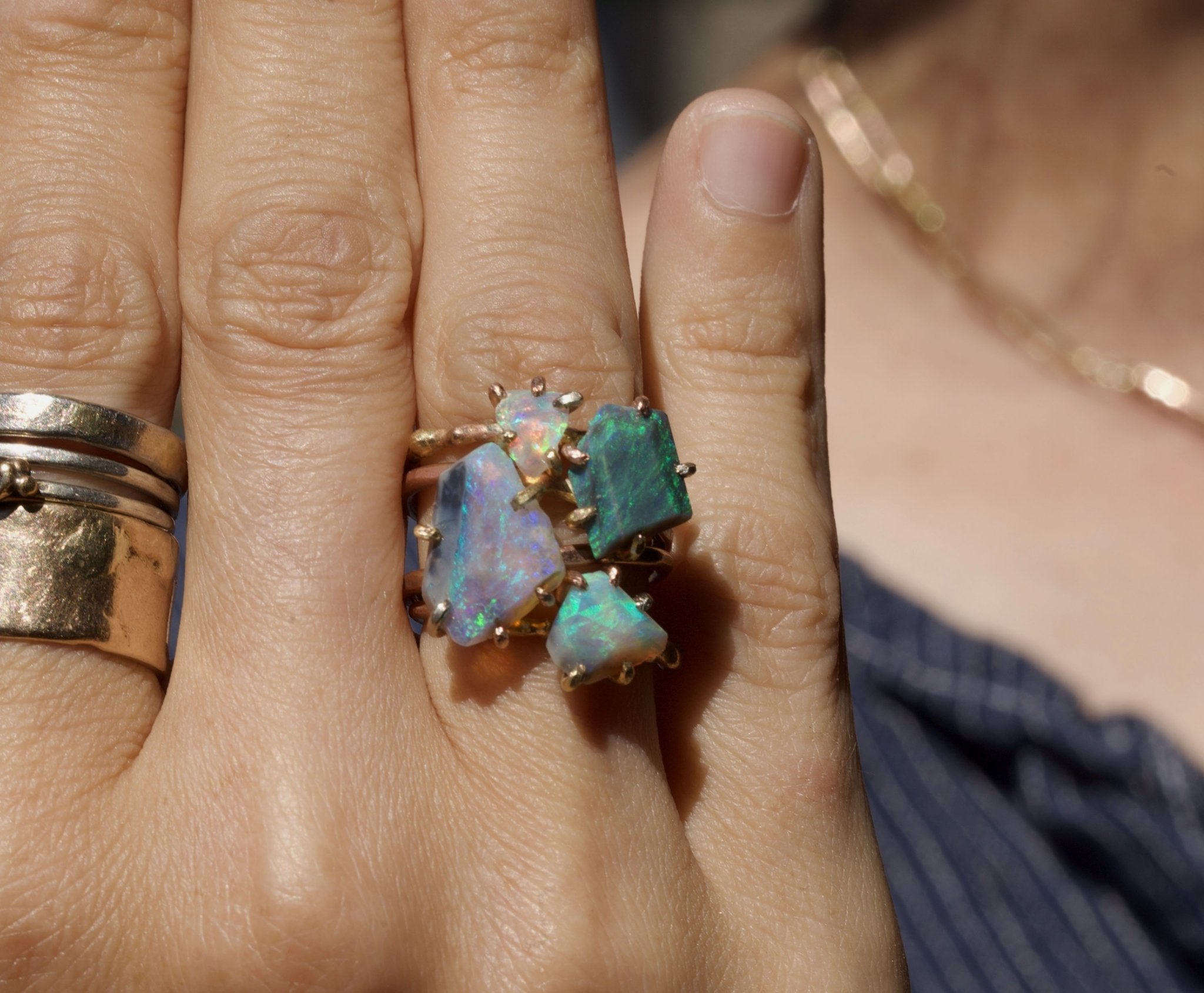 Exceptional opal rings on hand