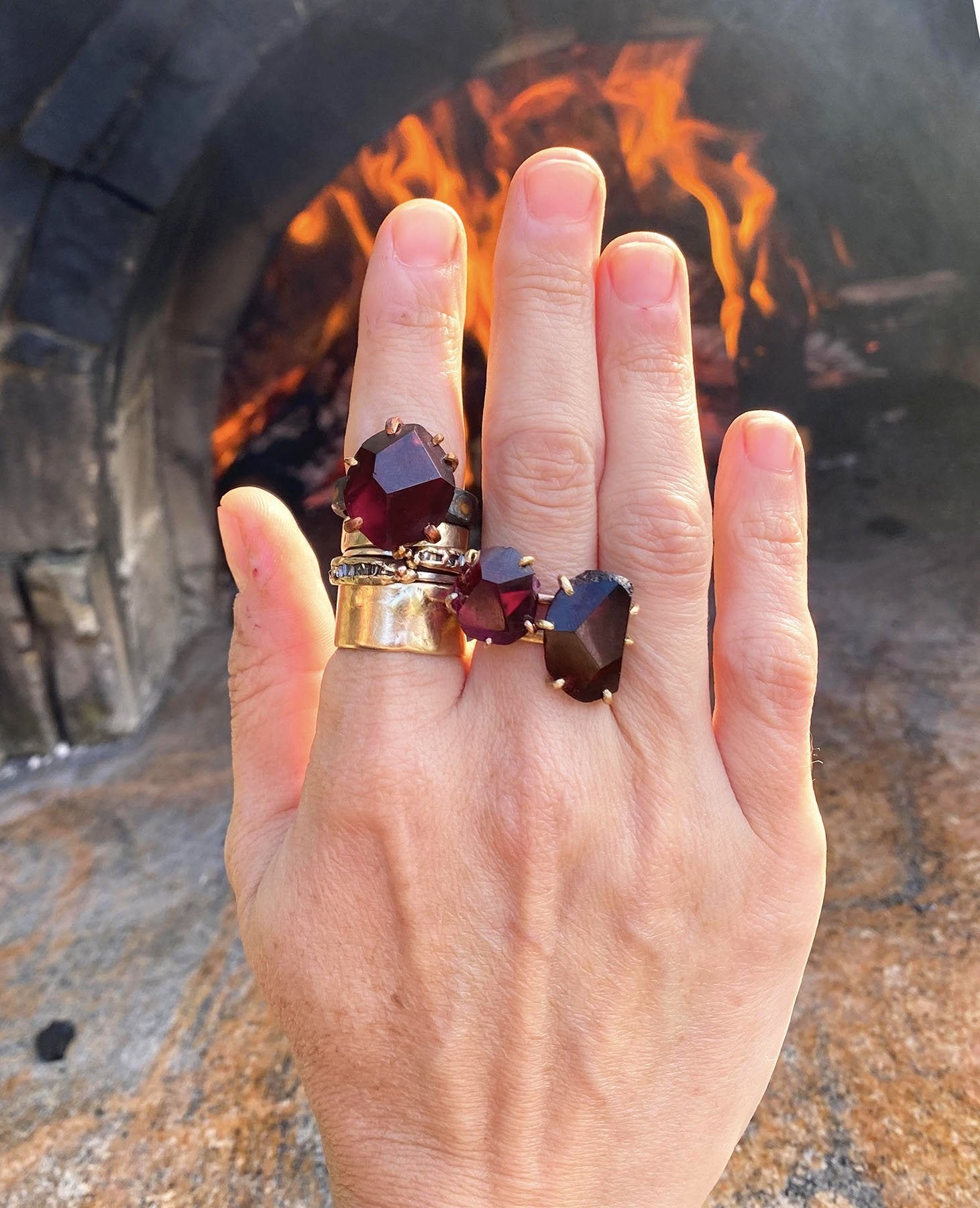 Malawi Garnet rings on hand