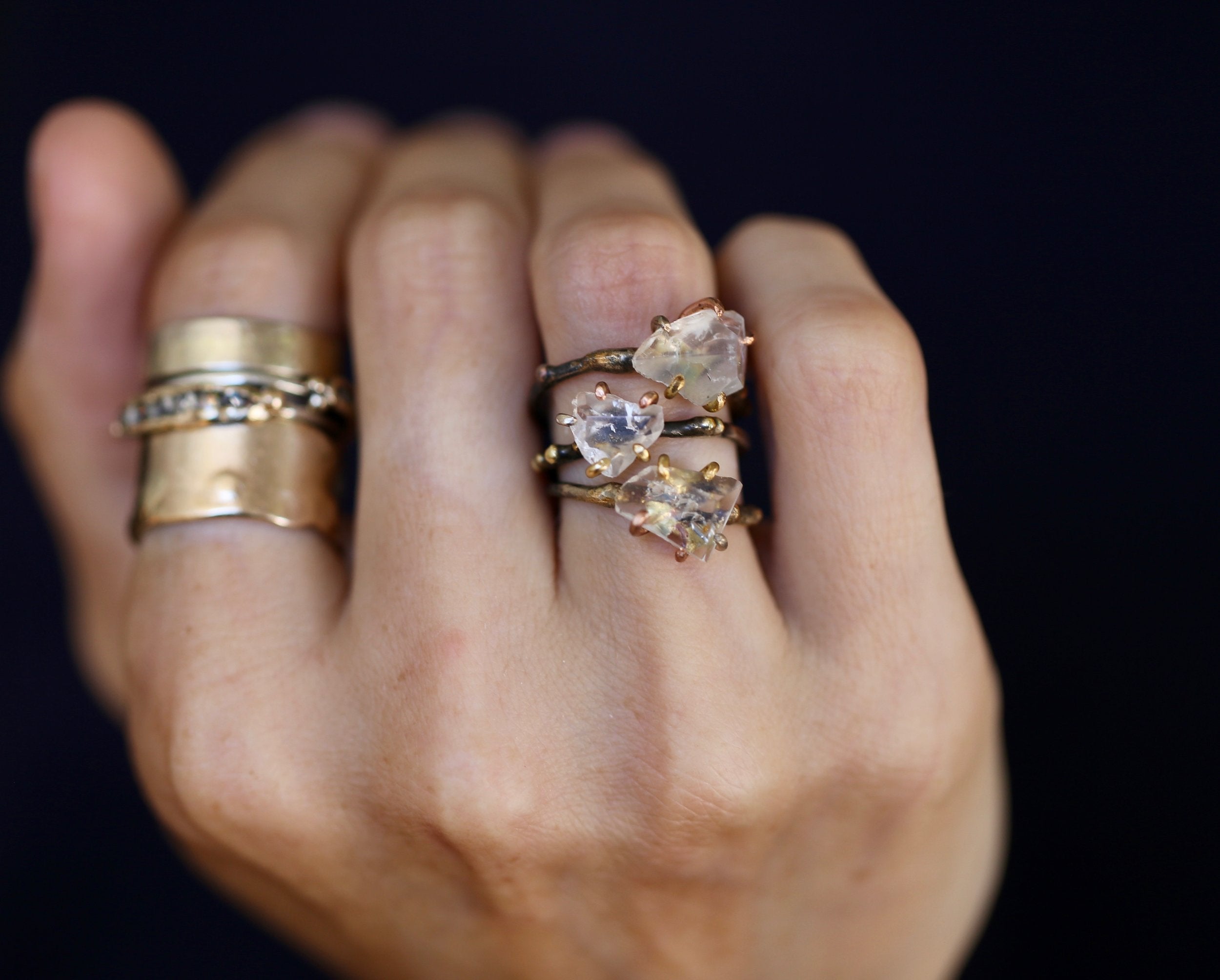 Goshenite rings on hand