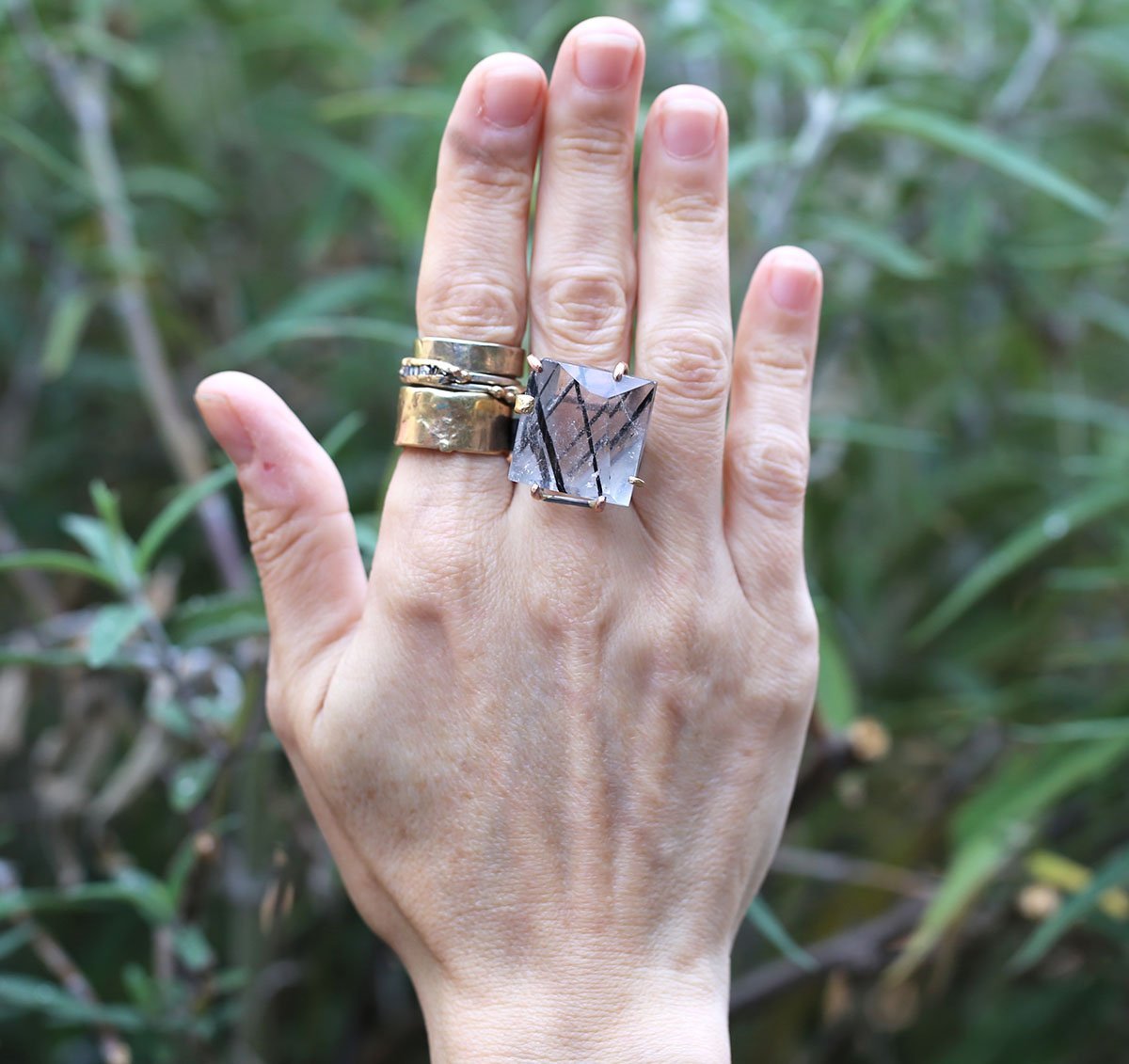 Tourmalated Quartz large ring on hand