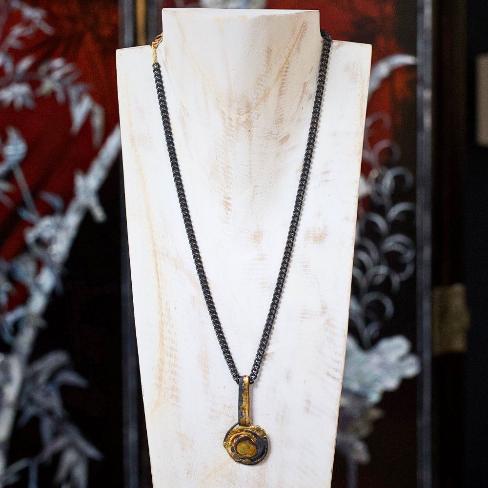 Menswear Chain with an Extra Large Smashed Precious Metal Pendant