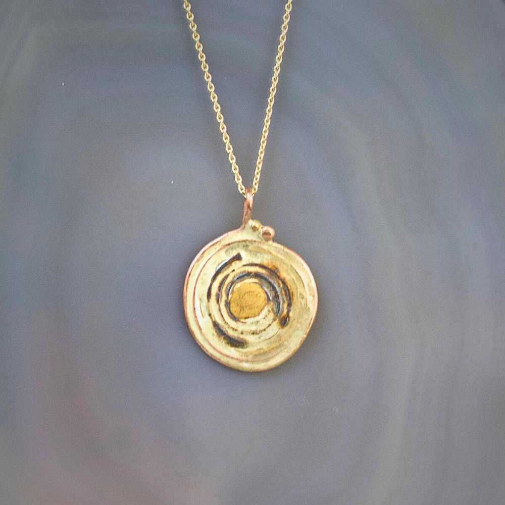 Evil Eye Pendant with a Yellow Gold Cable Chain