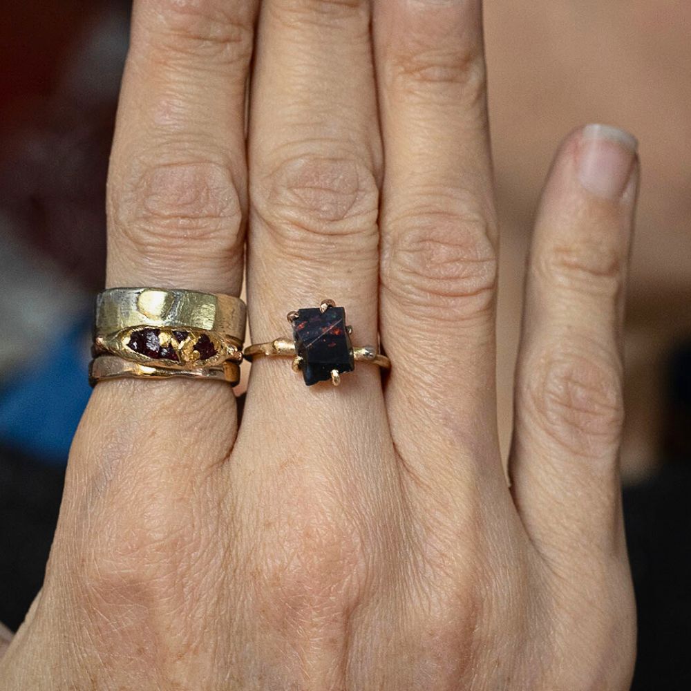 Australian Dark Opal Small Stone Ring on a Yellow Gold Band