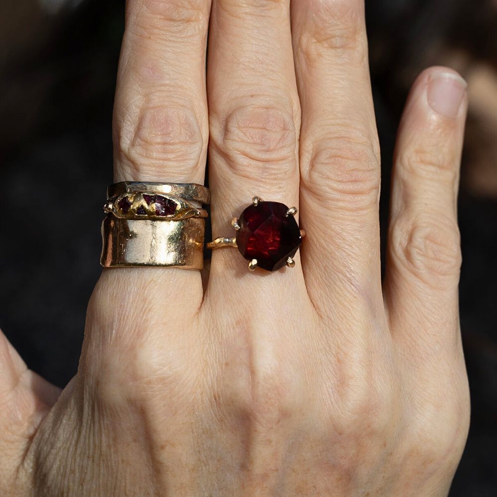 Garnet Medium Stone Ring on a Yellow Gold Band