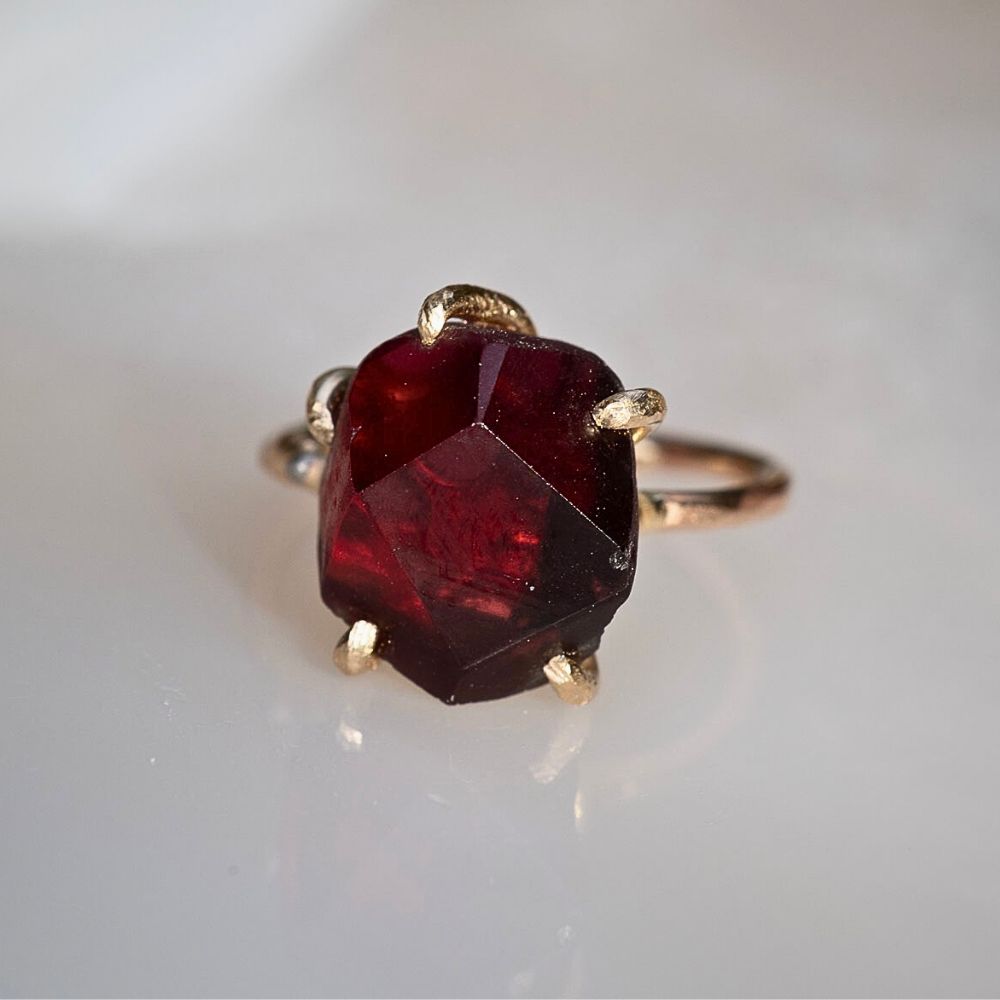 Garnet Medium Stone Ring on a Yellow Gold Band