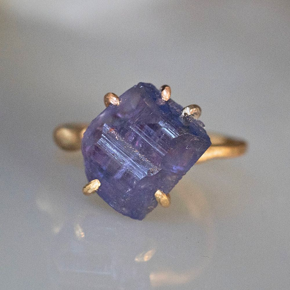 Tanzanite Medium Stone Ring on a Yellow Gold Band