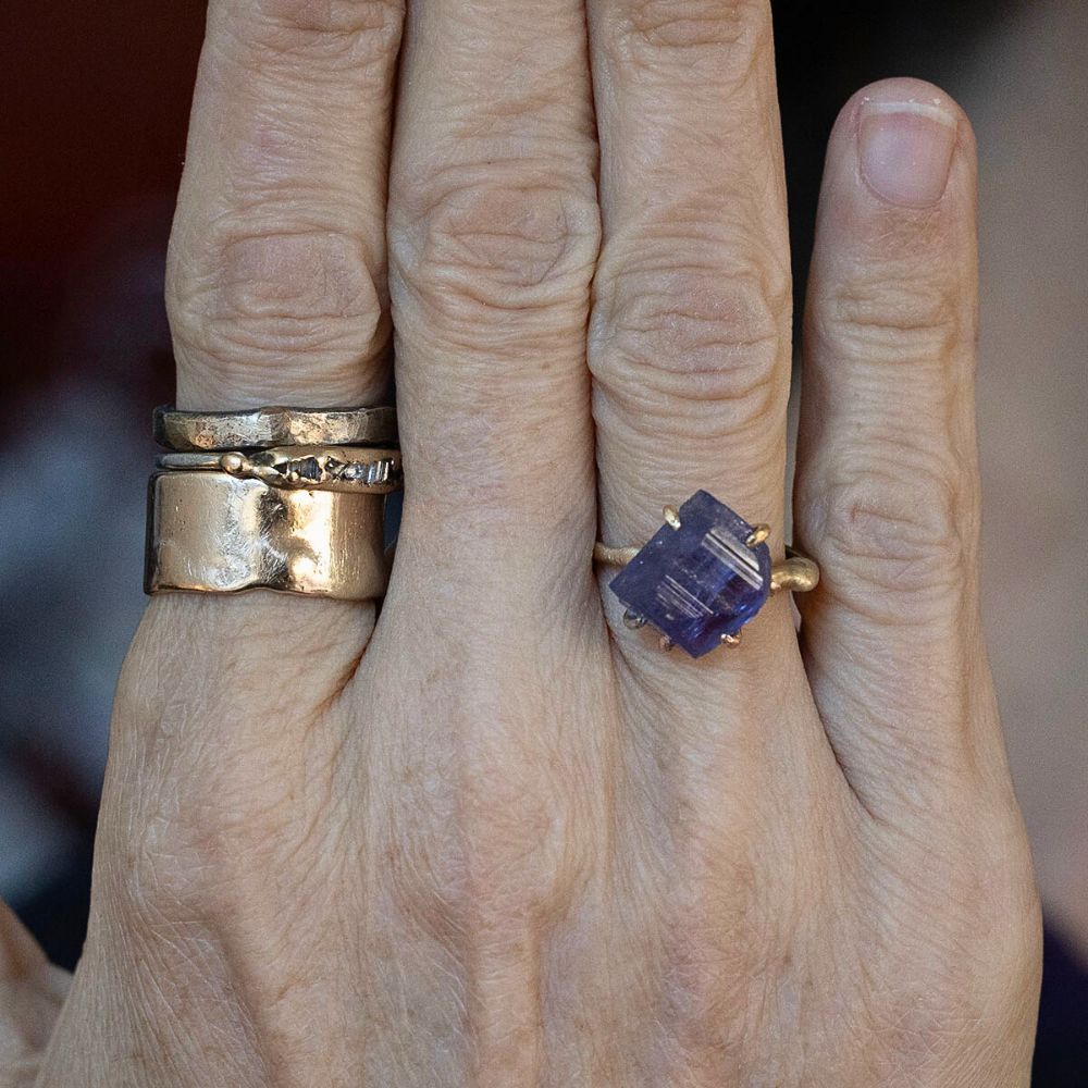 Tanzanite Medium Stone Ring on a Yellow Gold Band