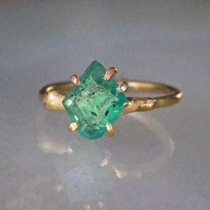 Zambian Emerald Small Stone Ring on a Yellow Gold Embedded Band