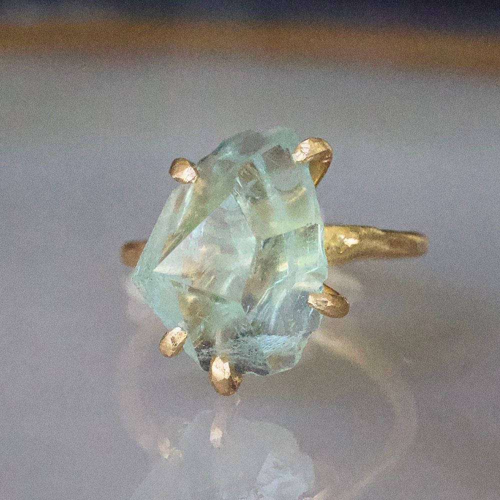 Aquamarine Medium Stone Ring on a Yellow Gold Embedded Band