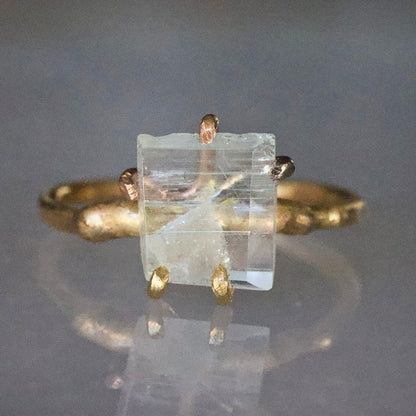 Aquamarine Small Stone Ring on a Yellow Gold Embedded Band