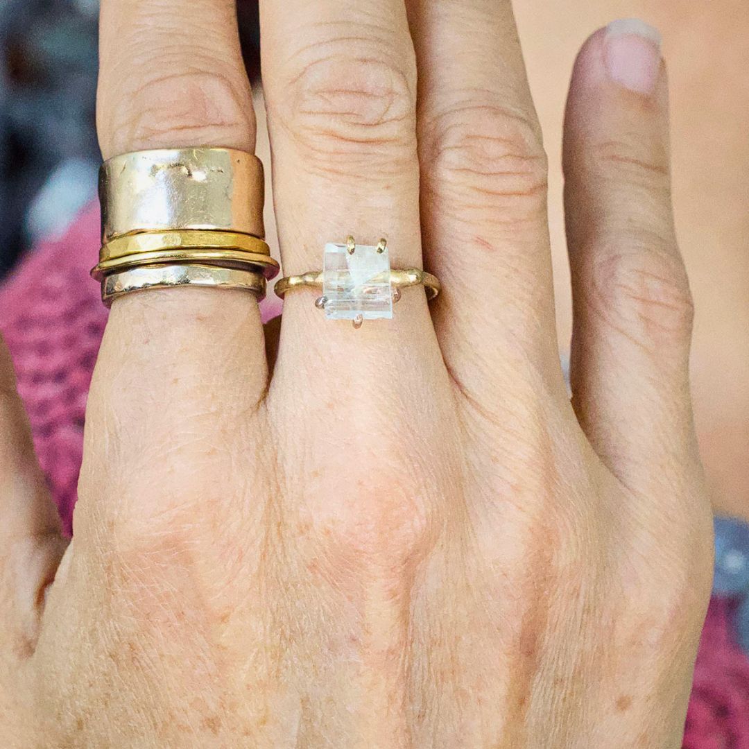 Aquamarine Small Stone Ring on a Yellow Gold Embedded Band