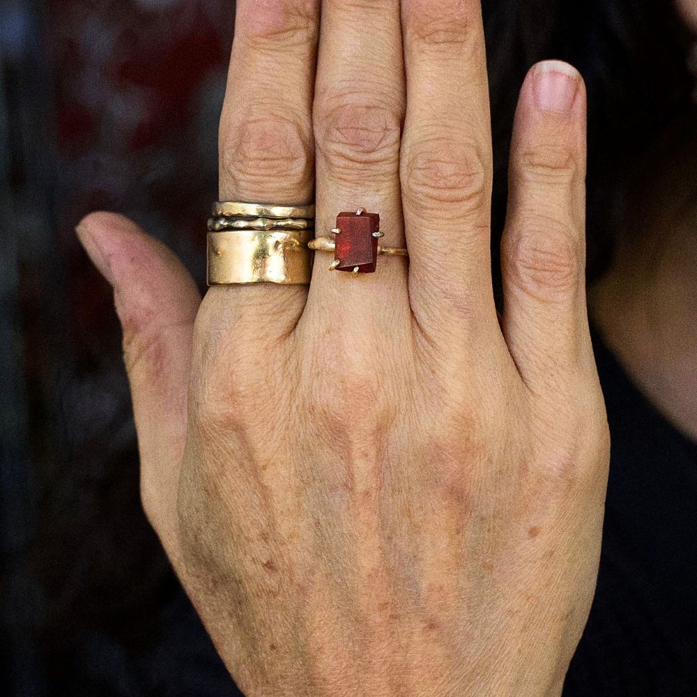 Carnelian Medium Stone Ring on a Yellow Gold Embedded Band
