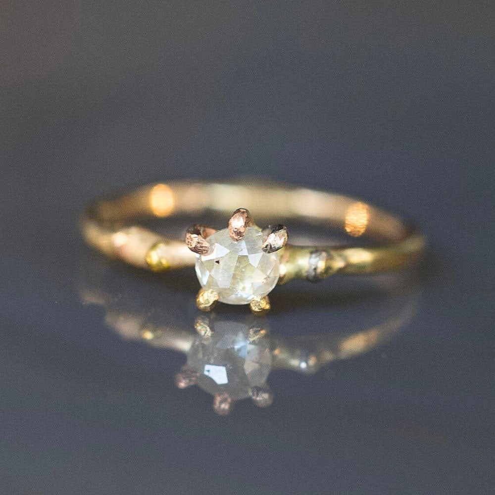 White .4ct Rose Cut Diamond Ring on a Yellow Gold Band
