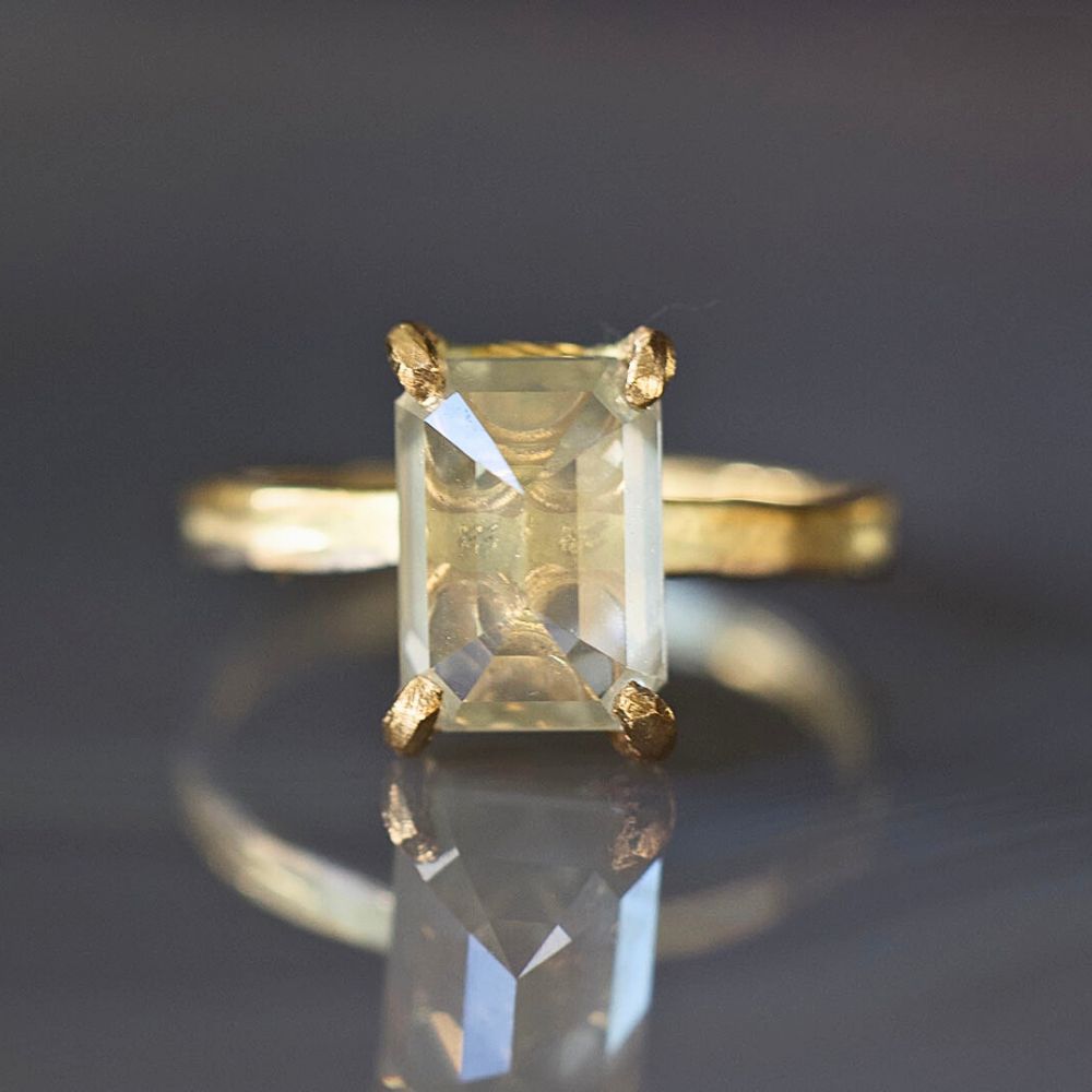 Emerald Cut 3.3CT Diamond on our 2MM Gold Skinny Seamed Band