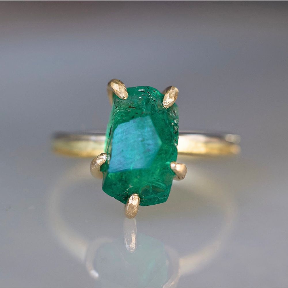 Zambian Emerald Medium Stone Ring on a Yellow Gold Embedded Band
