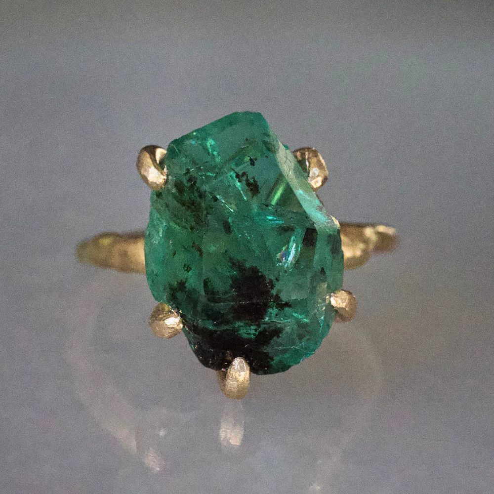 Zambian Emerald Medium Stone Ring on a Yellow Gold Embedded Band