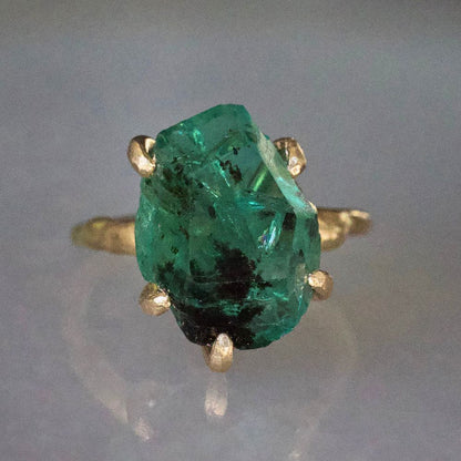 Zambian Emerald Medium Stone Ring on a Yellow Gold Embedded Band