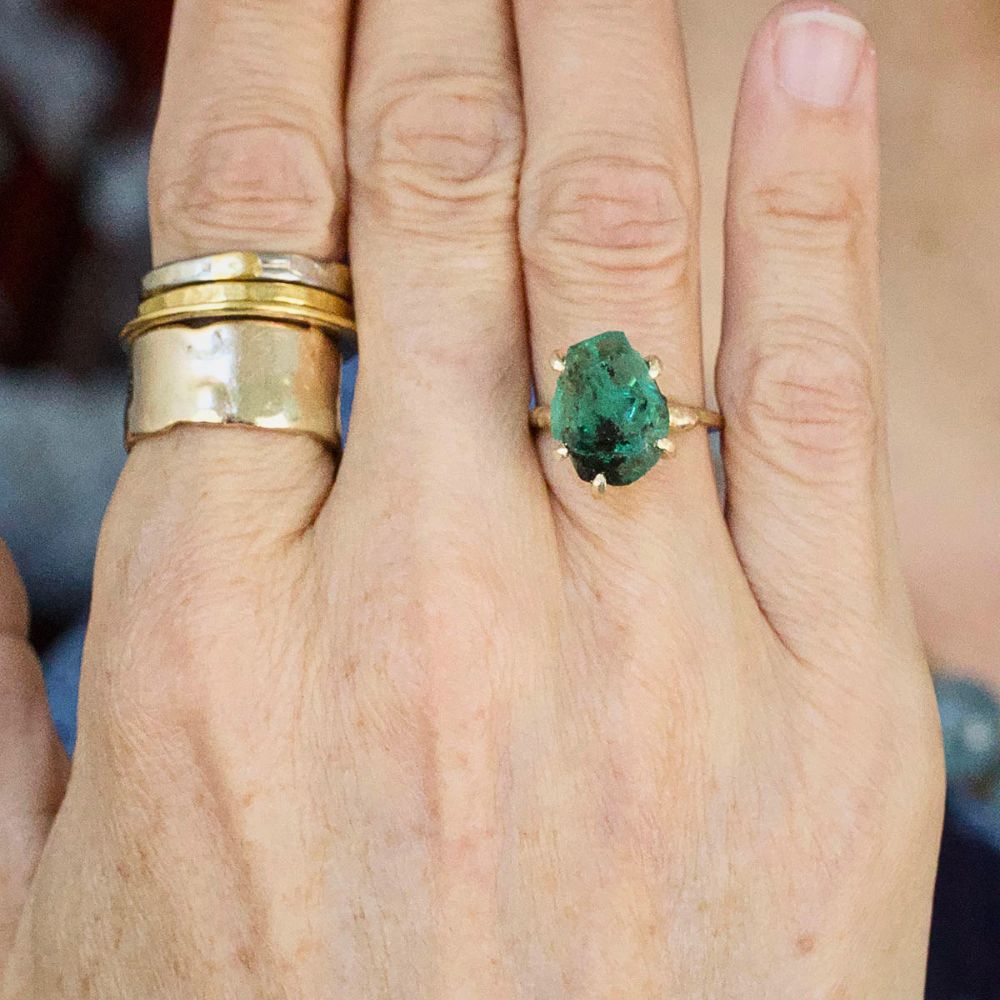Zambian Emerald Medium Stone Ring on a Yellow Gold Embedded Band