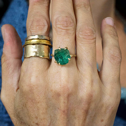 Zambian Emerald Medium Stone Ring on a Yellow Gold Embedded Band
