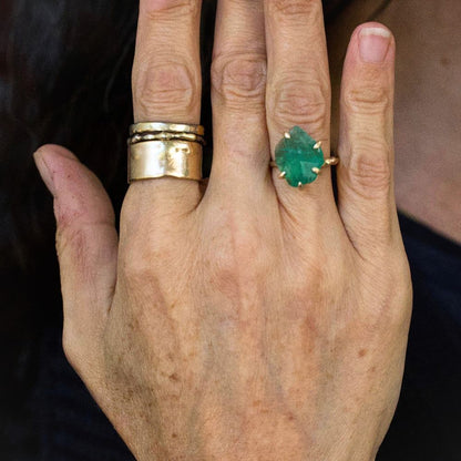 Zambian Emerald Medium Stone Ring on a Yellow Gold Embedded Band