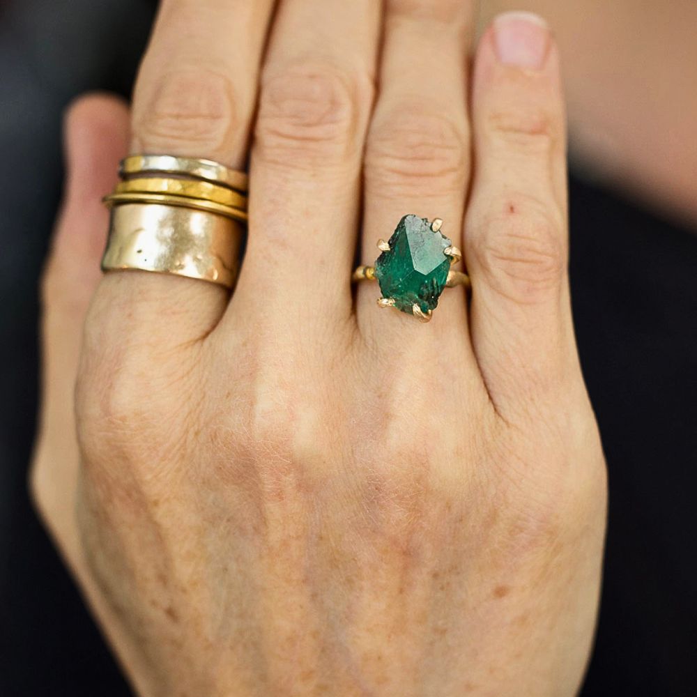 Zambian Emerald Medium Stone Ring on a Yellow Gold Embedded Band