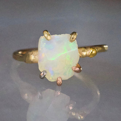 Australian Opal Small Stone Ring on a Yellow Gold Embedded Band