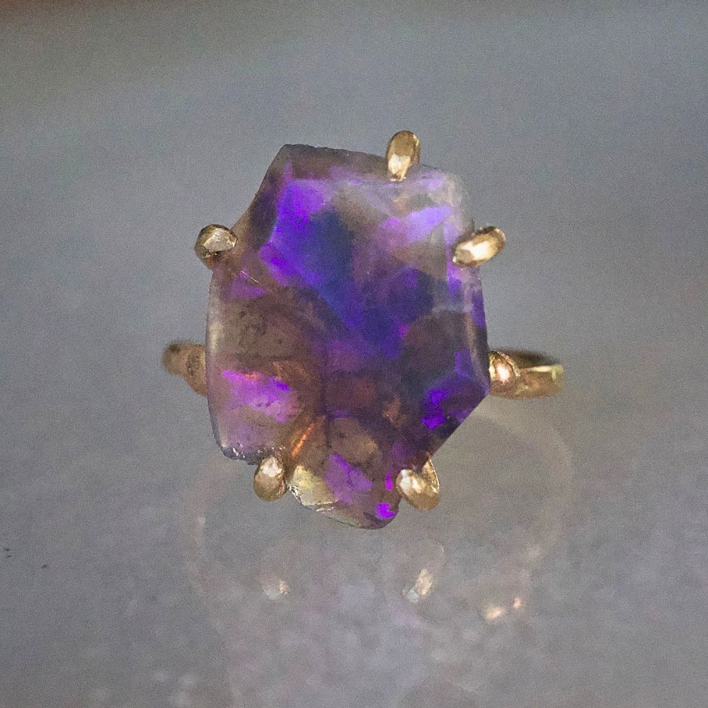 Australian Purple Opal Medium Stone Ring on a Yellow Gold Embedded Band
