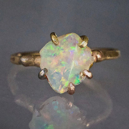 Australian Exceptional Opal Small Stone Ring on a Yellow Gold Embedded Band