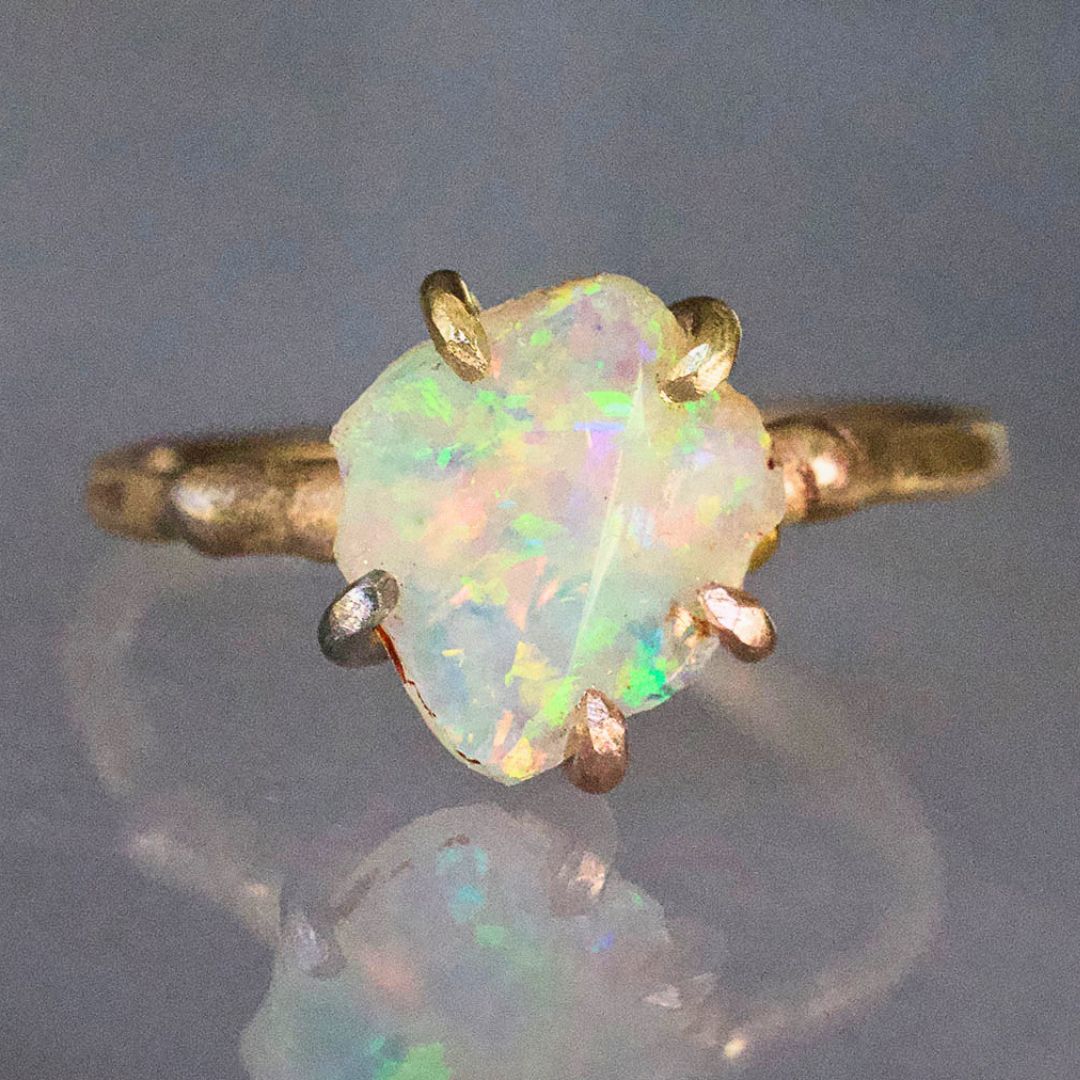 Australian Exceptional Opal Small Stone Ring on a Yellow Gold Embedded Band