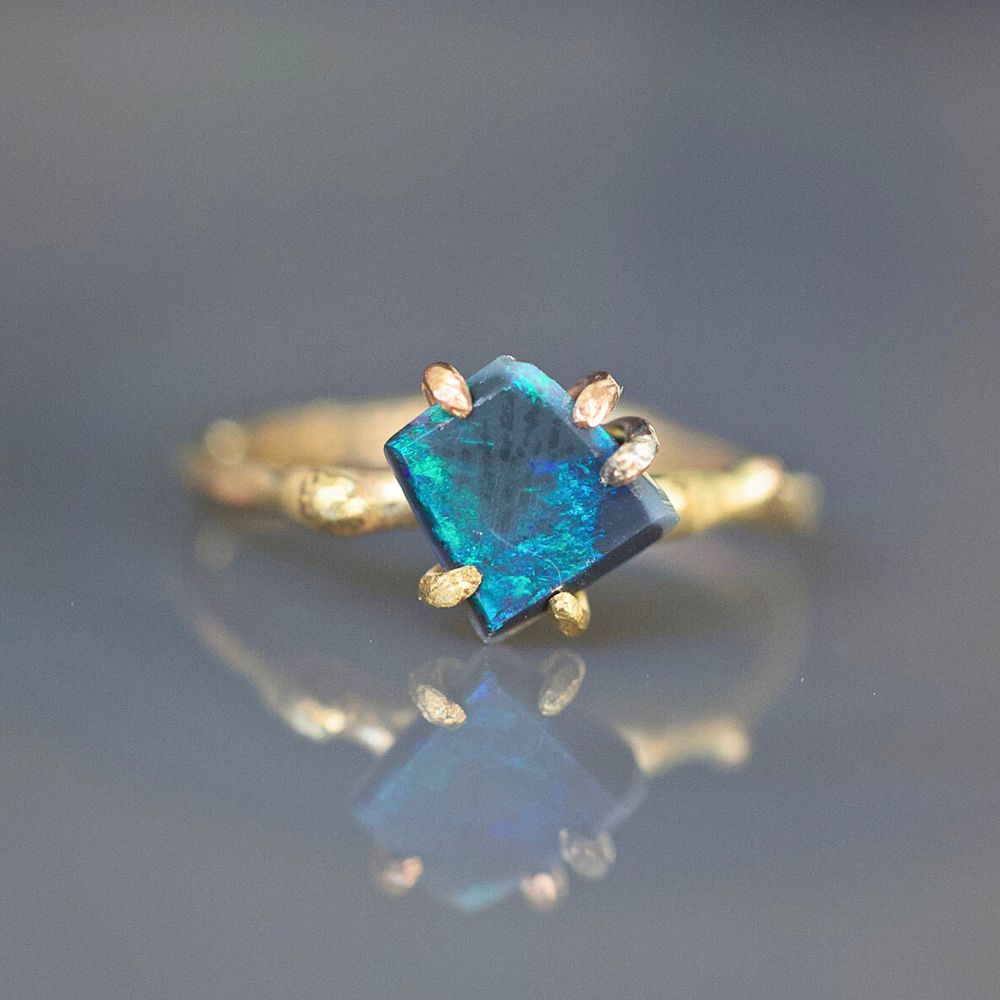 Australian Dark Opal Small Stone Ring on a Yellow Gold Band