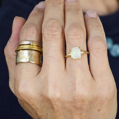 Australian Opal Small Stone Ring on a Yellow Gold Embedded Band