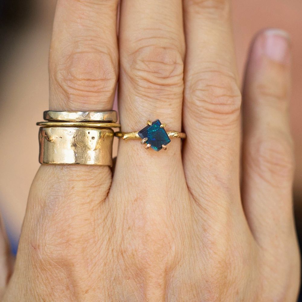 Australian Dark Opal Small Stone Ring on a Yellow Gold Band