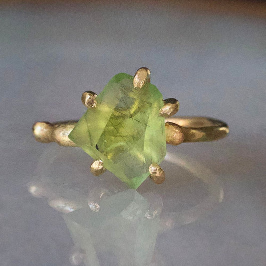 Peridot Small Stone Ring on a Yellow Gold Embedded Band