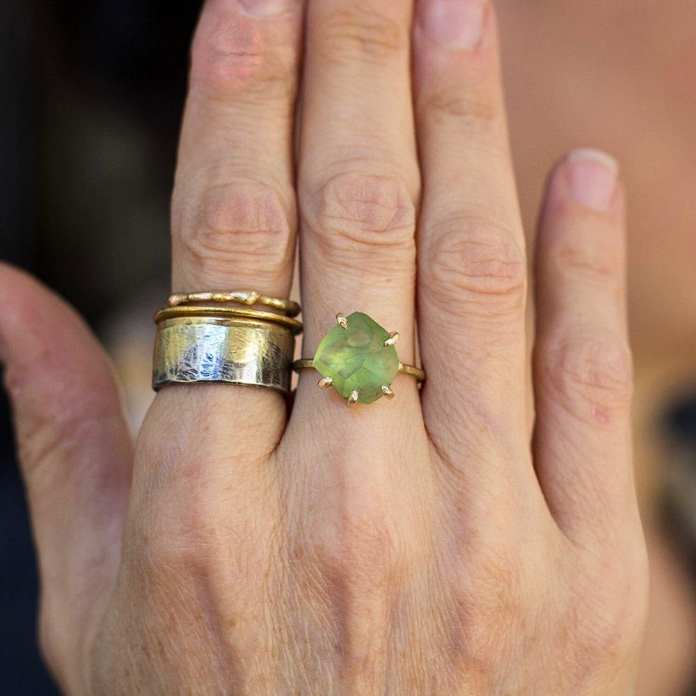 Peridot Medium Stone Ring on a Yellow Gold Band