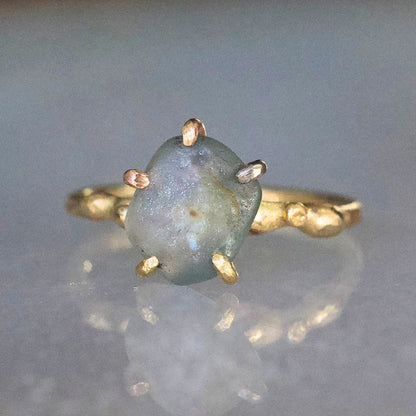 Rough Montana Sapphire Small Stone Ring on a Yellow Gold Embedded Band