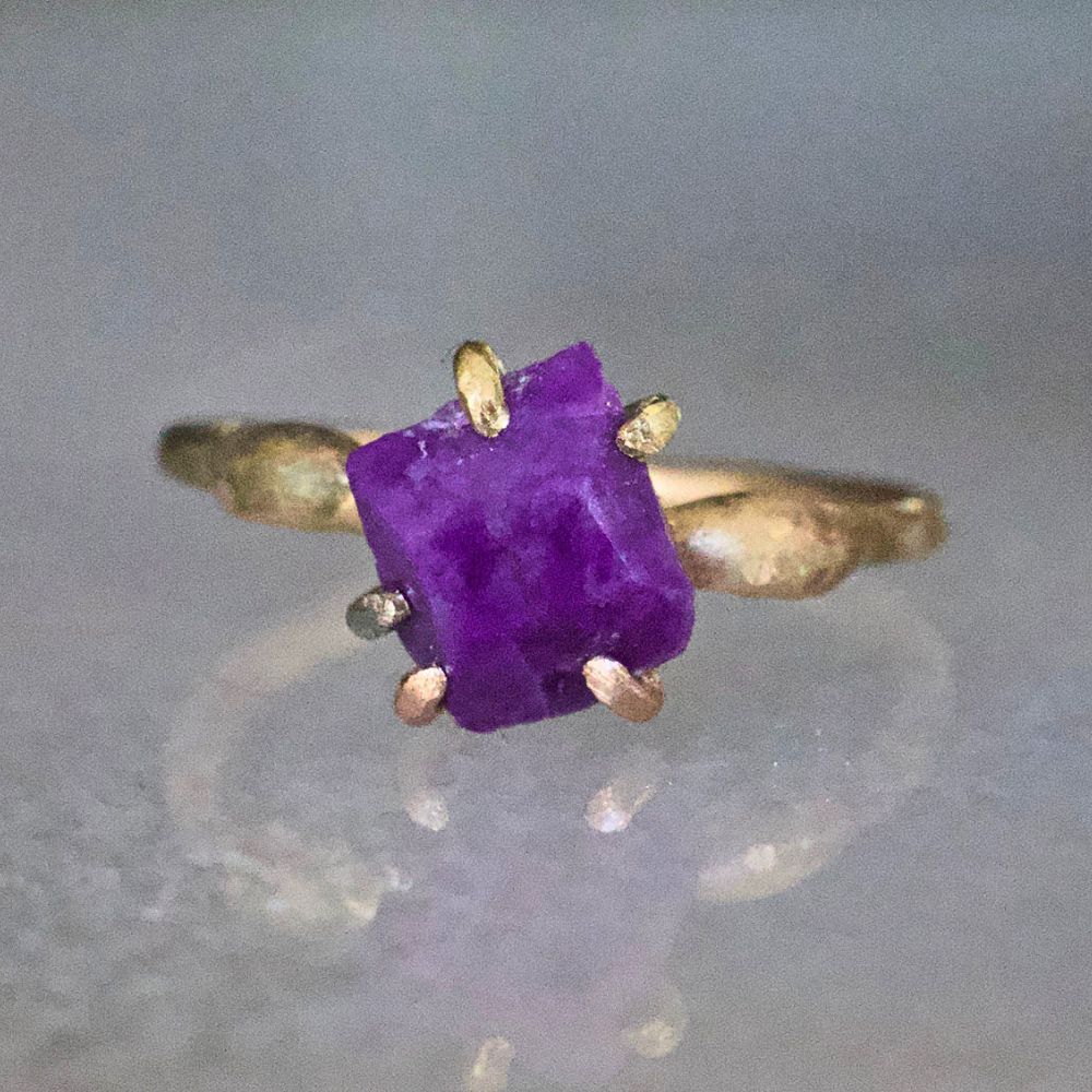 Sugilite Small Stone Ring on a Yellow Gold Embedded Band