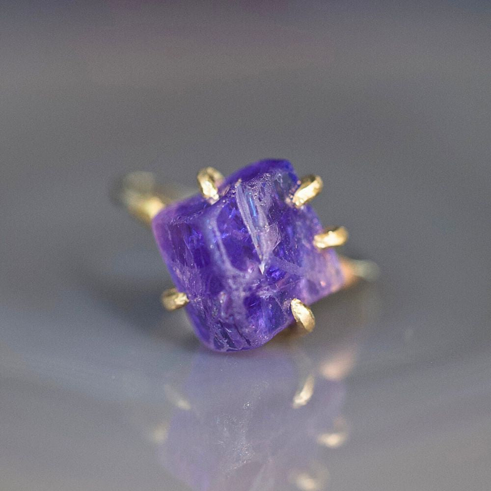 Tanzanite Medium Stone Ring on a Palladium and Gold Band