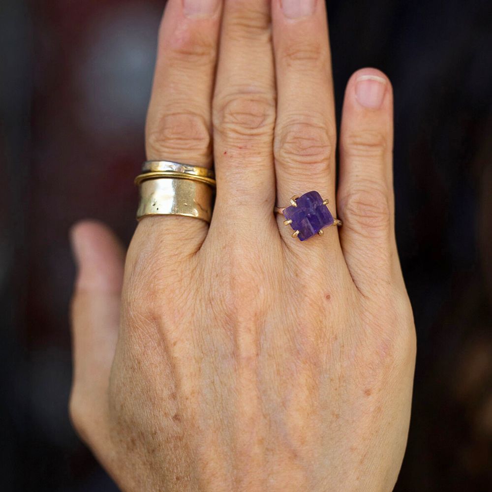 Tanzanite Medium Stone Ring on a Palladium and Gold Band